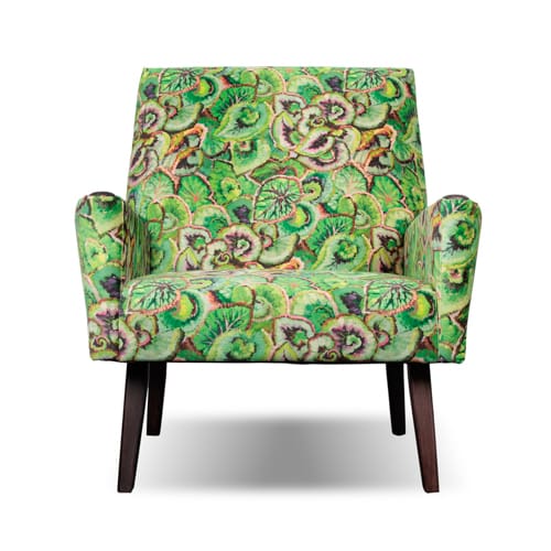 Comfortabele Dyker 65 Leaf Glaze fauteuil in botanische print, met 60’s vibe en stijlvolle houten details